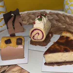 Bûches de Noël Lyon Mariiller les Saveurs Desserts Noël halal Bûche nuit étoilée Bûche Franklin pistache Bûche Bobosse sans gluten Pâtisseries festives Lyon Chocolat Valrhona Noël Bûches originales Lyon Noël gourmand halal